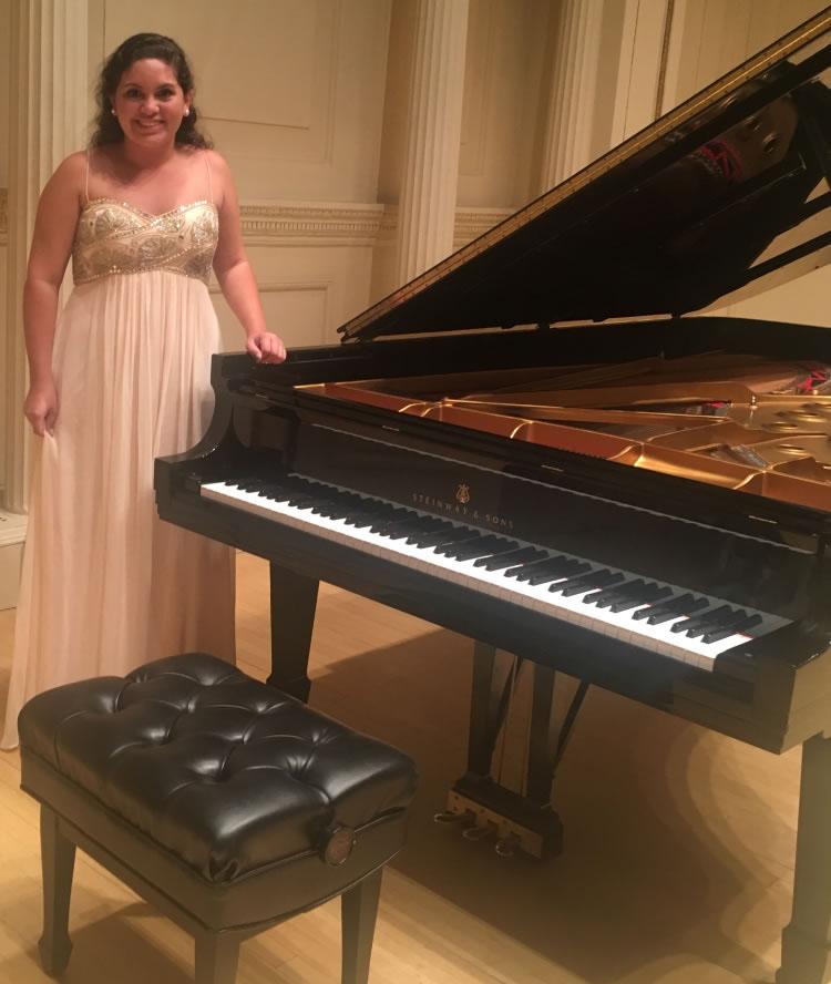 Senior Madison Cavazos poses for a quick photo after a morning of rehearsing "Granada" by Isaac Albeniz for her performance at Carnegie Hall in New York on Sept. 16