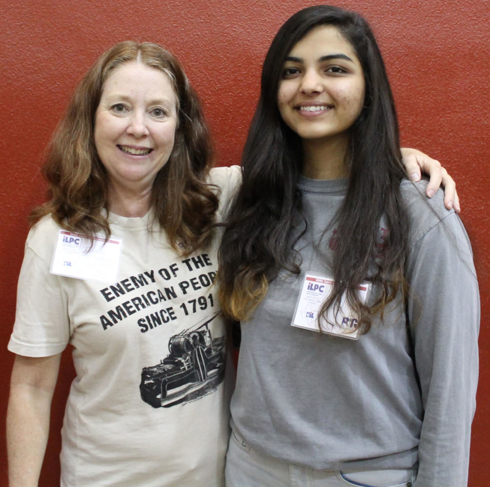 Waldron Street Journal adviser Jeanette Krizak and senior editor-in-chief Nikita Adhikari pose for a photo together at the Interscholastic League Press Conference at UT-Austin on April 22. This was the first time in the last four years that the newspaper won awards for writing in the UIL ILPC division 5A-2.  