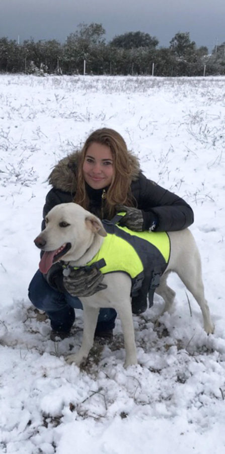 Freshman MaKenzie Clark and her dog enjoyed a snow day in Corpus Christi on Dec. 8.