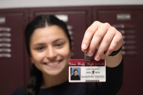 Junior Jade Carranza with her ID, per school policy